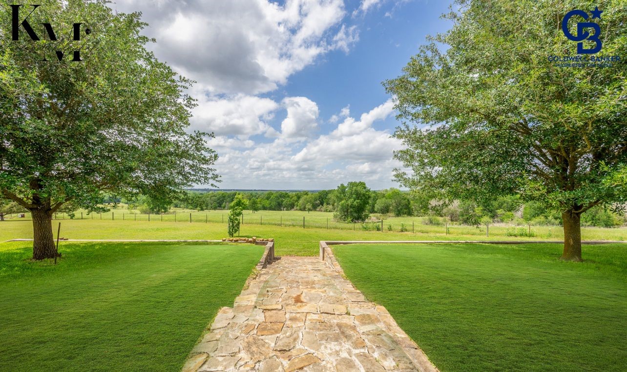 1980 Chappell Ridge Lane Brenham, TX 77833 - Photo 11 of 13 Expansive backyard set on over 1.6 acres, offering endless possibilities for outdoor living, recreation, or simply enjoying the wide-open country views.