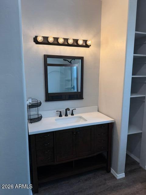1129 11th Street Douglas, AZ 85607 - Photo 7 of 13 a bathroom with a sink and a mirror