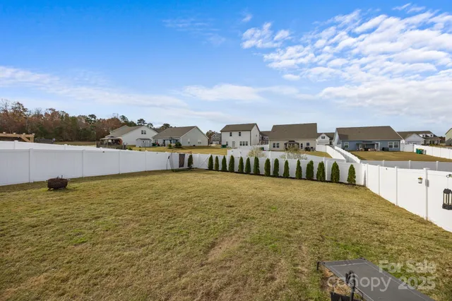 an aerial view of a house with a garden