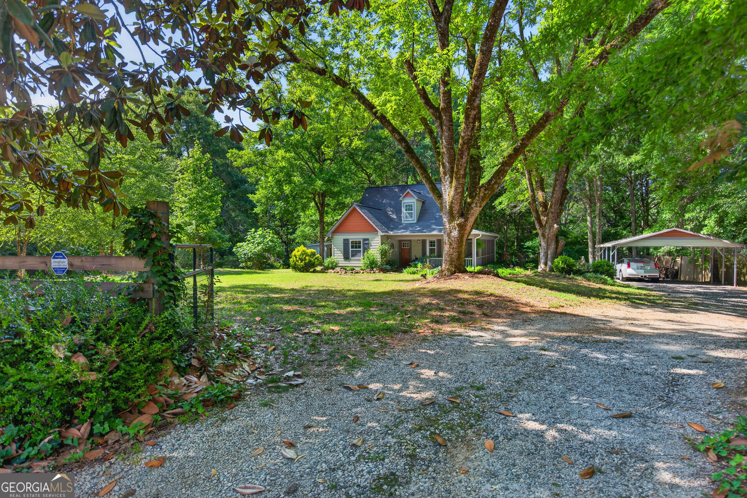 4656 Greenville Road LaGrange, GA 30241 - Photo 2 of 34 a house with trees in the background