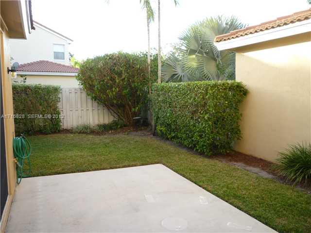 4070 Tree Top Road Cooper City, FL 33026 - Photo 12 of 12 a view of a back yard