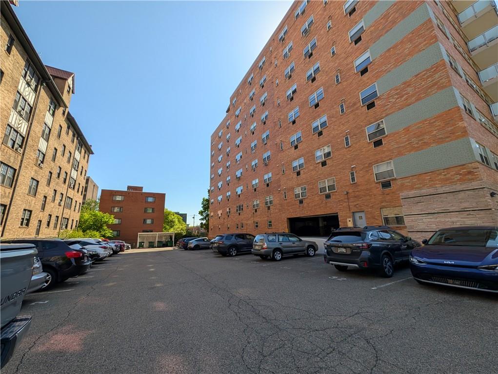 144 North Dithridge Street, Unit 403 Pittsburgh, PA 15213 - Photo 28 of 31 a view of a cars parked in front of a building