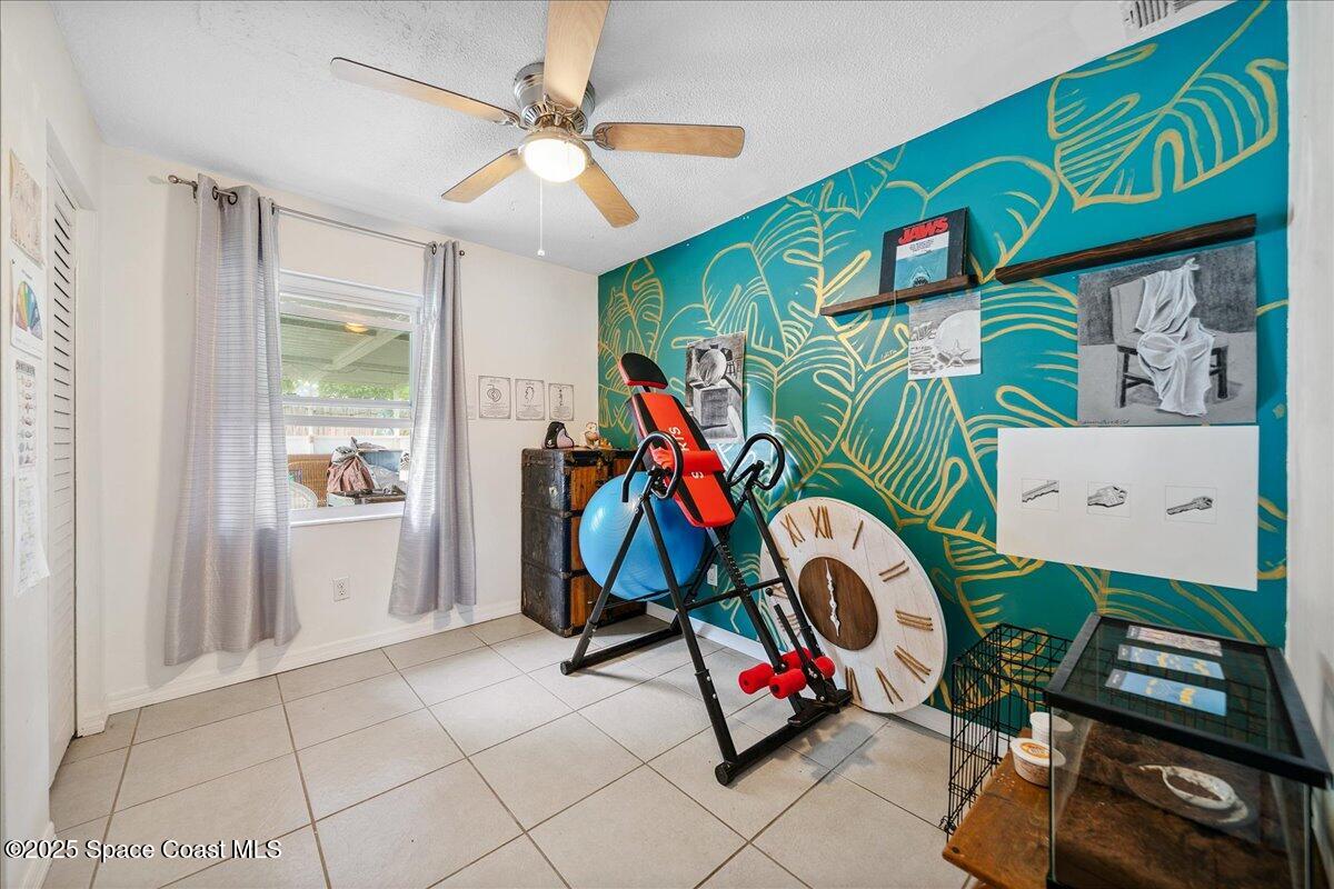 1405 Fiddler Avenue Merritt Island, FL 32952 - Photo 21 of 43 a view of play room with windows