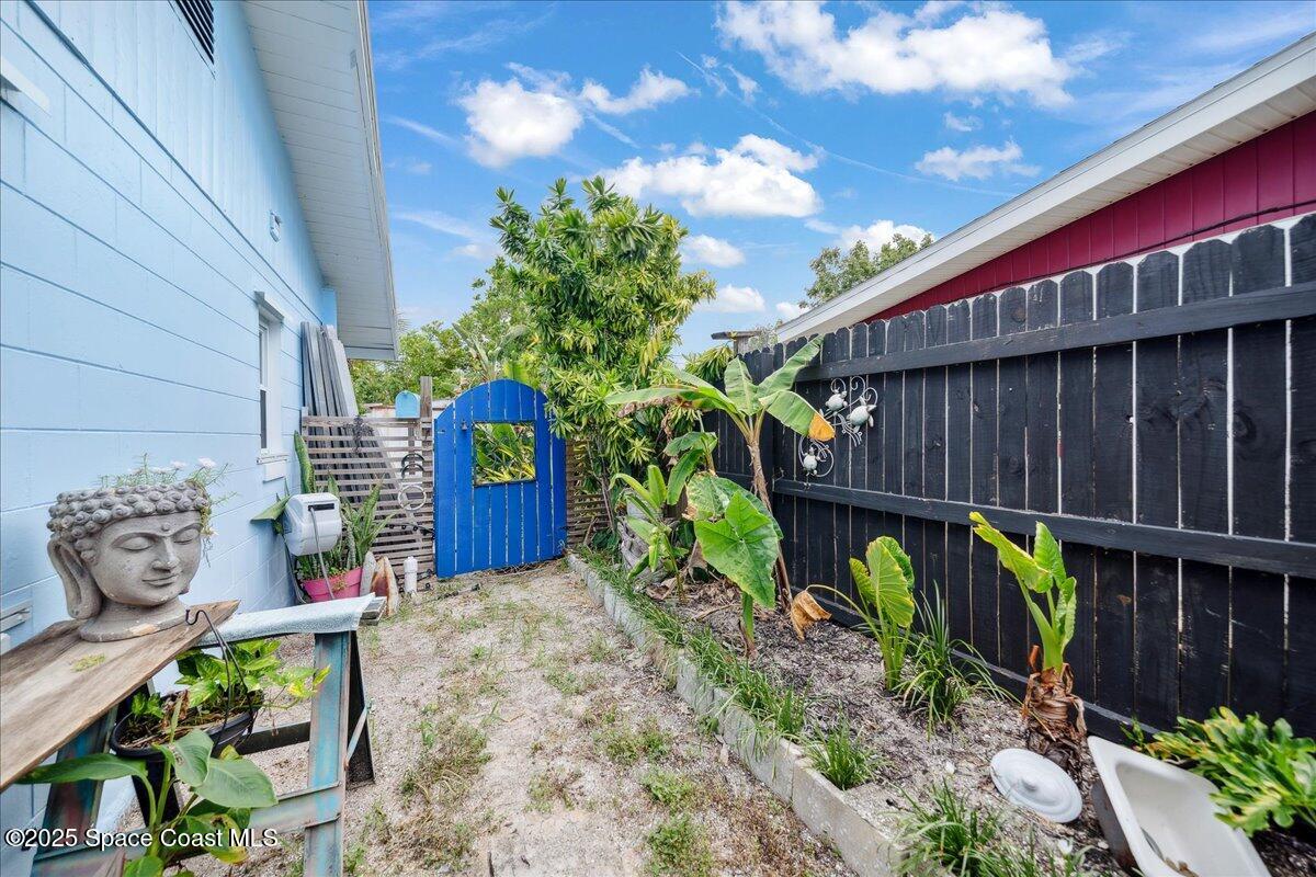 1405 Fiddler Avenue Merritt Island, FL 32952 - Photo 27 of 43 a view of a wooden chairs in patio
