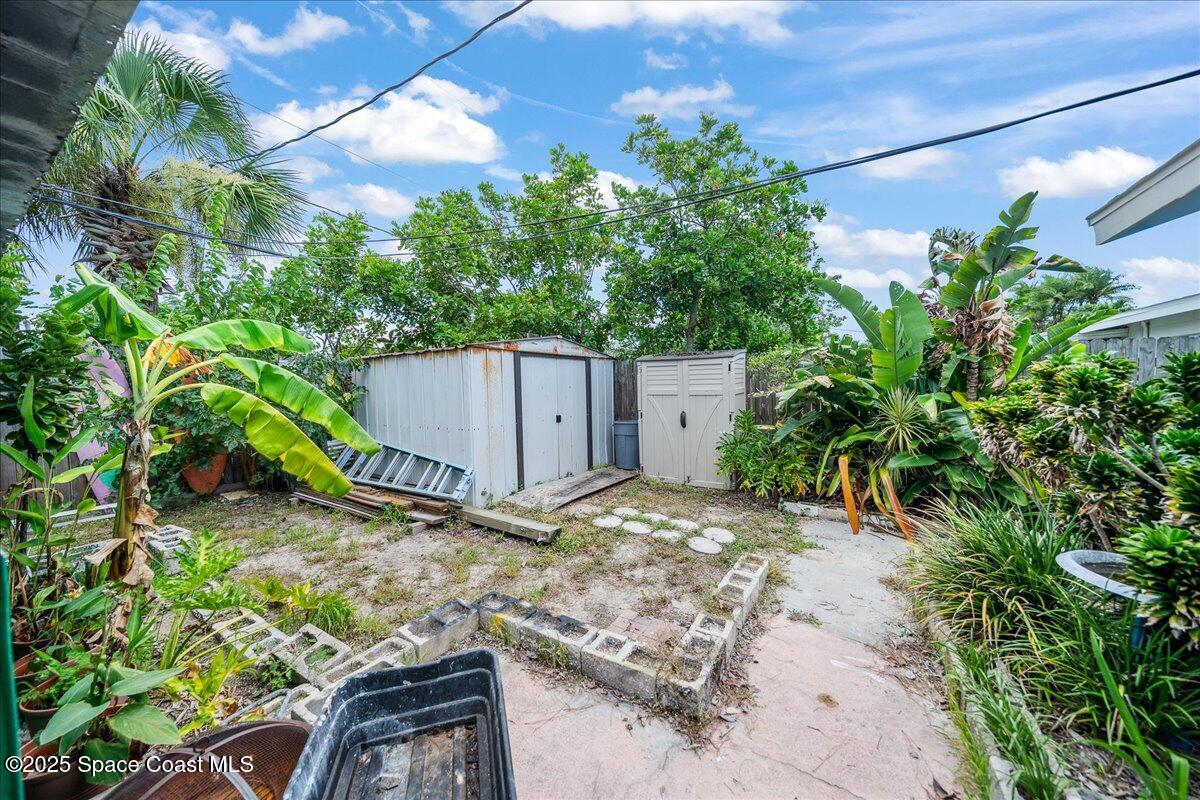 1405 Fiddler Avenue Merritt Island, FL 32952 - Photo 30 of 43 a view of a backyard