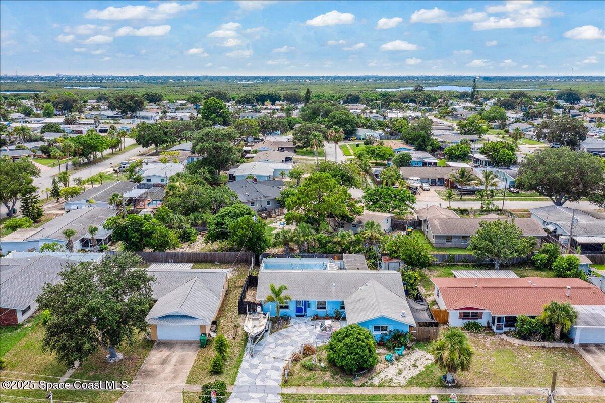 1405 Fiddler Avenue Merritt Island, FL 32952 - Photo 35 of 43 an aerial view of a houses with a lake view