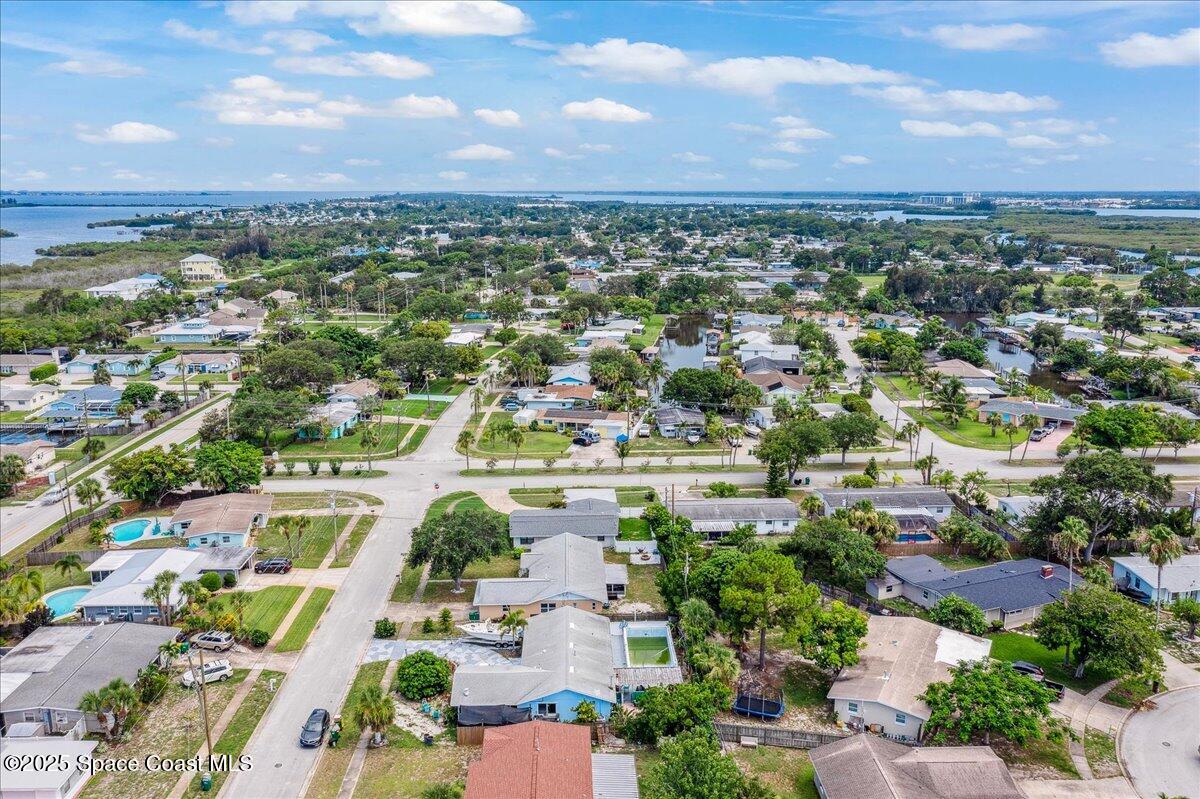 1405 Fiddler Avenue Merritt Island, FL 32952 - Photo 37 of 43 an aerial view of residential houses with outdoor space