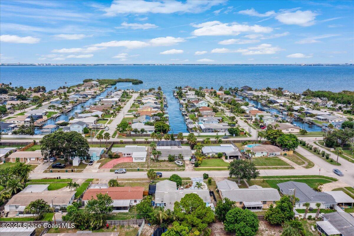 1405 Fiddler Avenue Merritt Island, FL 32952 - Photo 39 of 43 an aerial view of residential houses with outdoor space
