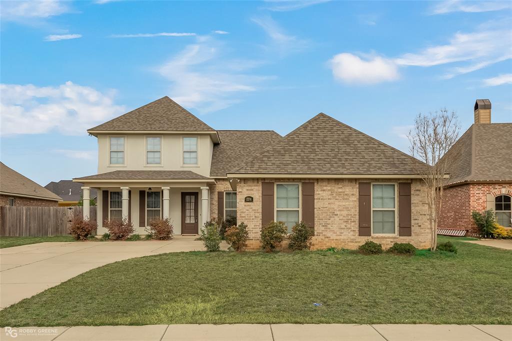 224 Danielle Drive Benton, LA 71006 - Photo 1 of 1 a front view of a house with a yard