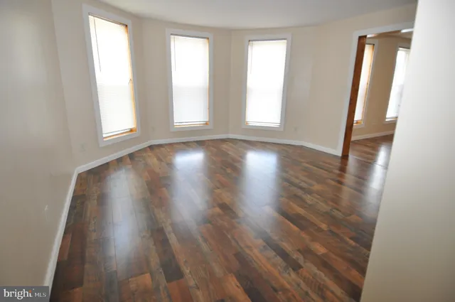 an empty room with windows