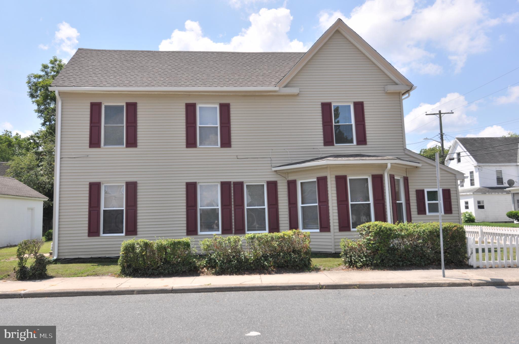 601 4th Street Pocomoke City, MD 21851 - Photo 5 of 35 a front view of multiple houses