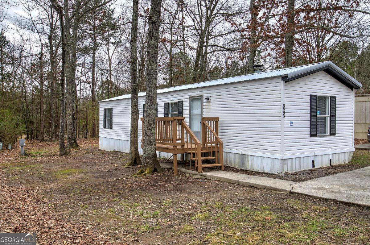 65 Tency Lane Northeast Rome, GA 30165 - Photo 20 of 20 a view of a house with backyard