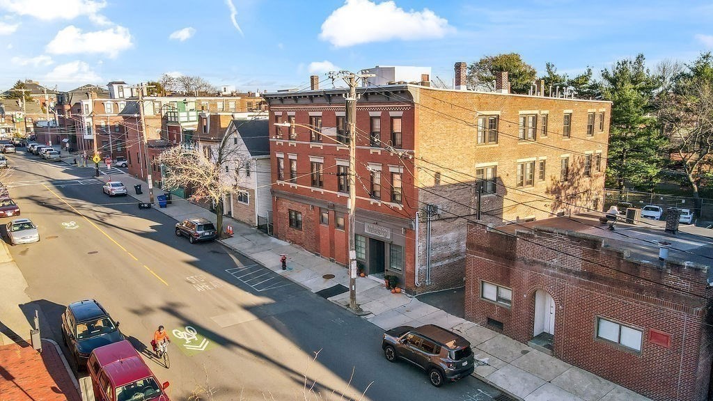 81 Broadway, Unit 1 Chelsea, MA 02150 - Photo 27 of 29 a car parked on the side of a street