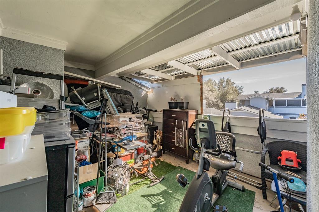 623 Ridgeline Drive Hurst, TX 76053 - Photo 26 of 29 a view of a storage room with washer and dryer