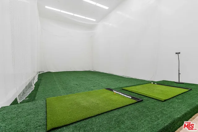 a view of workspace with wooden floor and bench