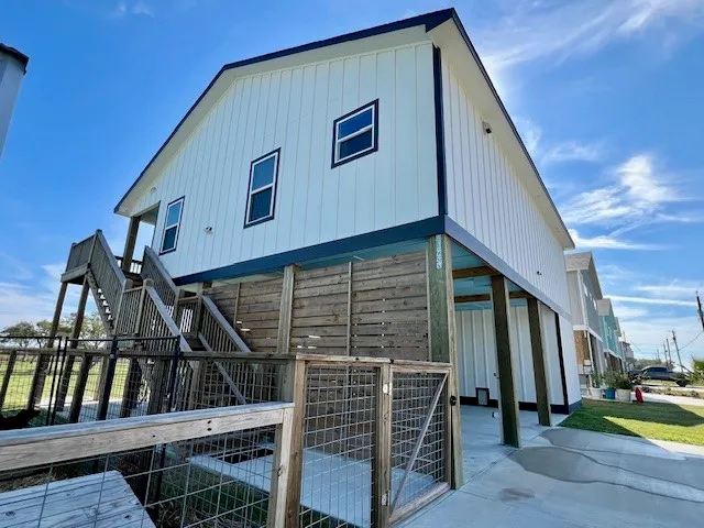 a view of a house with wooden stairs