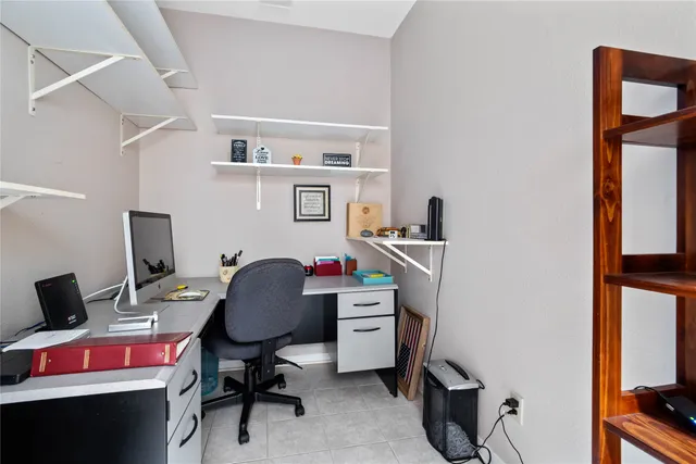 a bedroom with furniture and a window
