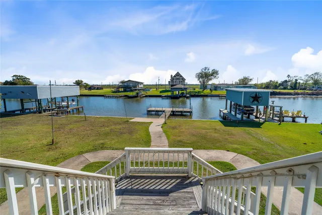 a view of a lake from a balcony