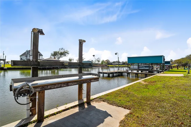 a view of swimming pool with seating area