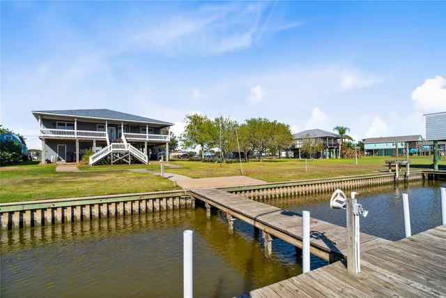 a view of a garage with rack and bicycle