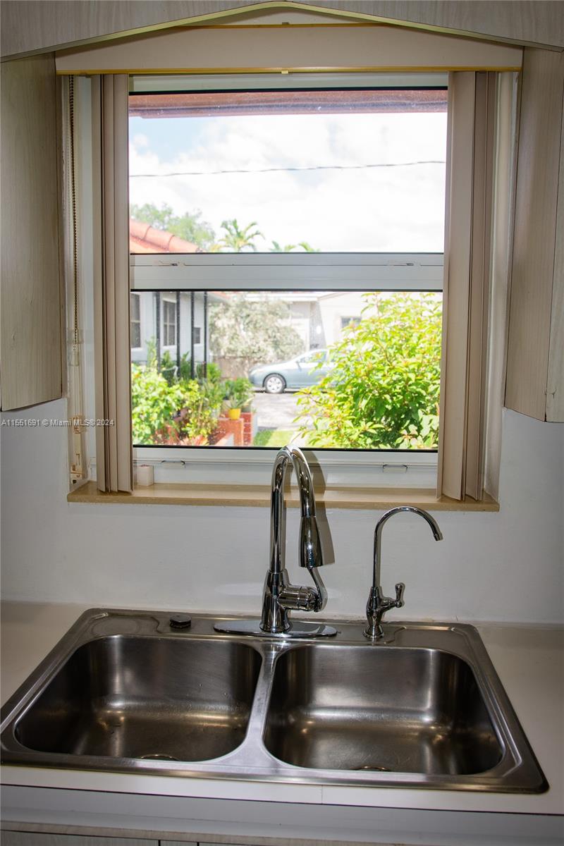 6005 Southwest 22nd Street Miami, FL 33155 - Photo 16 of 36 a close view of sink and tap