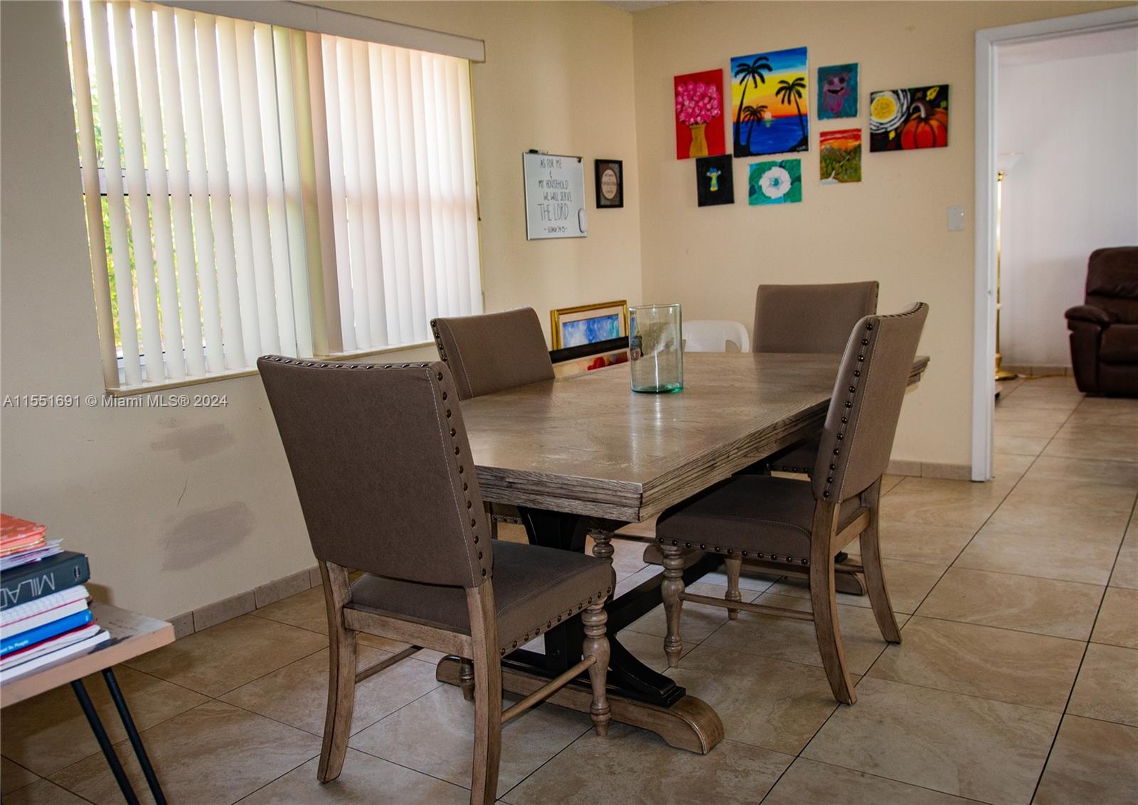6005 Southwest 22nd Street Miami, FL 33155 - Photo 18 of 36 a view of a dining room with furniture and a window