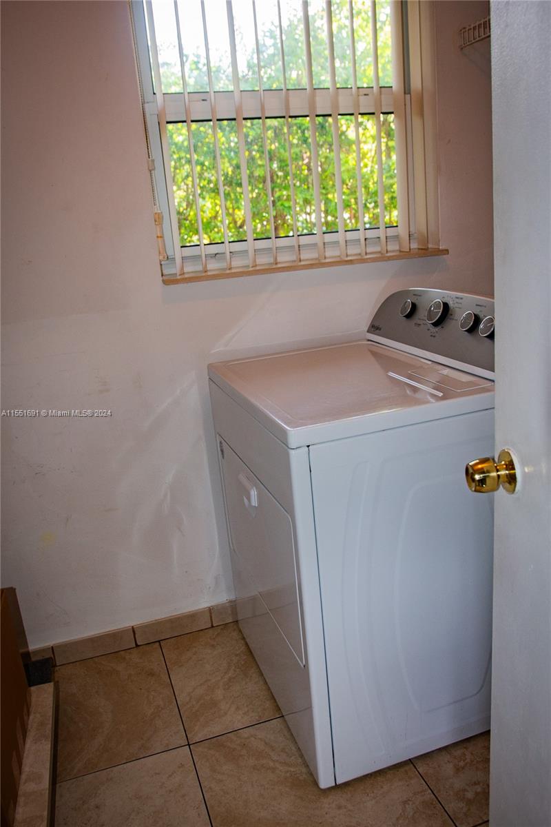6005 Southwest 22nd Street Miami, FL 33155 - Photo 19 of 36 a utility room with washer and dryer