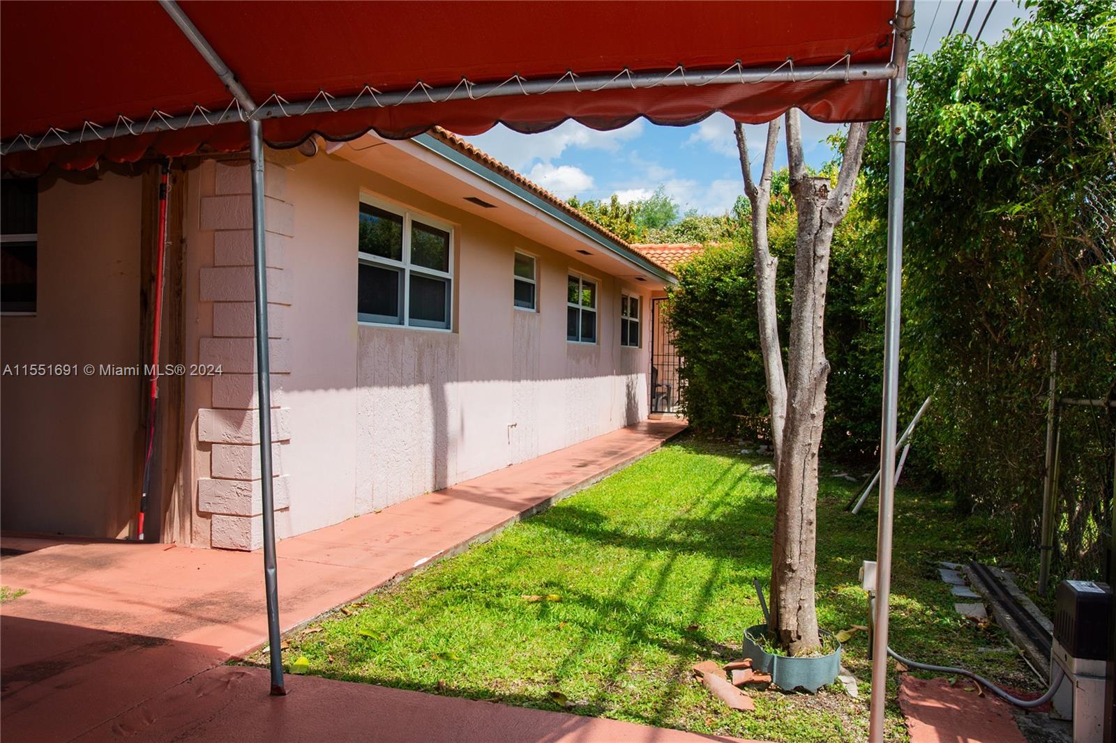 6005 Southwest 22nd Street Miami, FL 33155 - Photo 6 of 36 a view of a backyard with garden