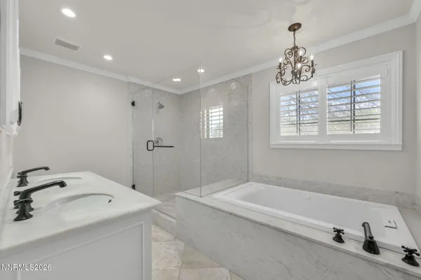 a bath tub sitting next to a window