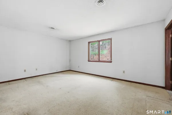 an empty room with a window