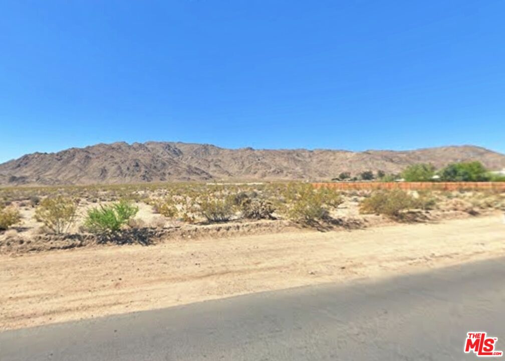 73459 Sullivan Road Twentynine Palms, CA 92277 - Photo 4 of 6 a view of an ocean and a mountain
