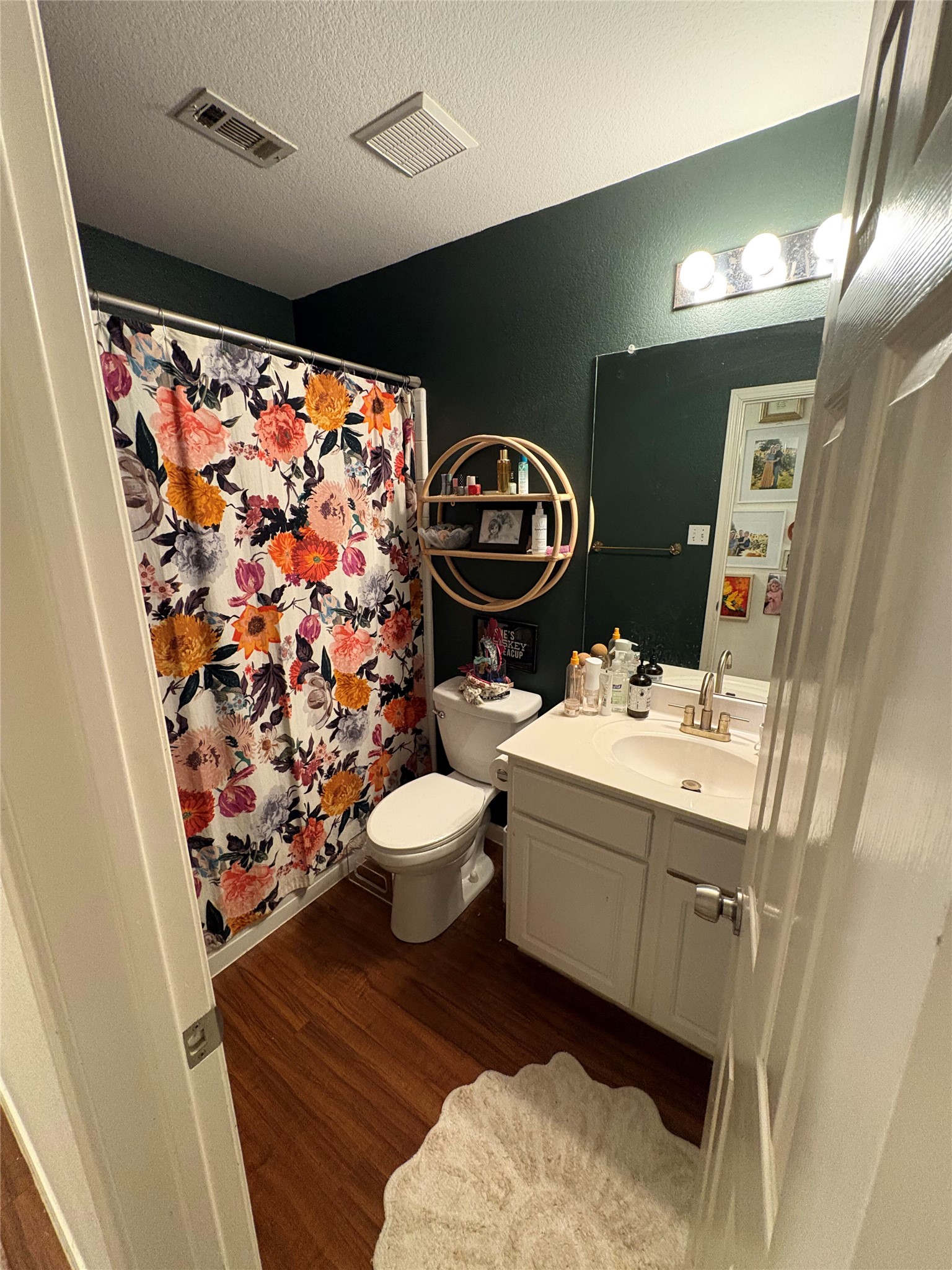 432 Hanover Court Georgetown, TX 78633 - Photo 9 of 14 a bathroom with a sink and a mirror