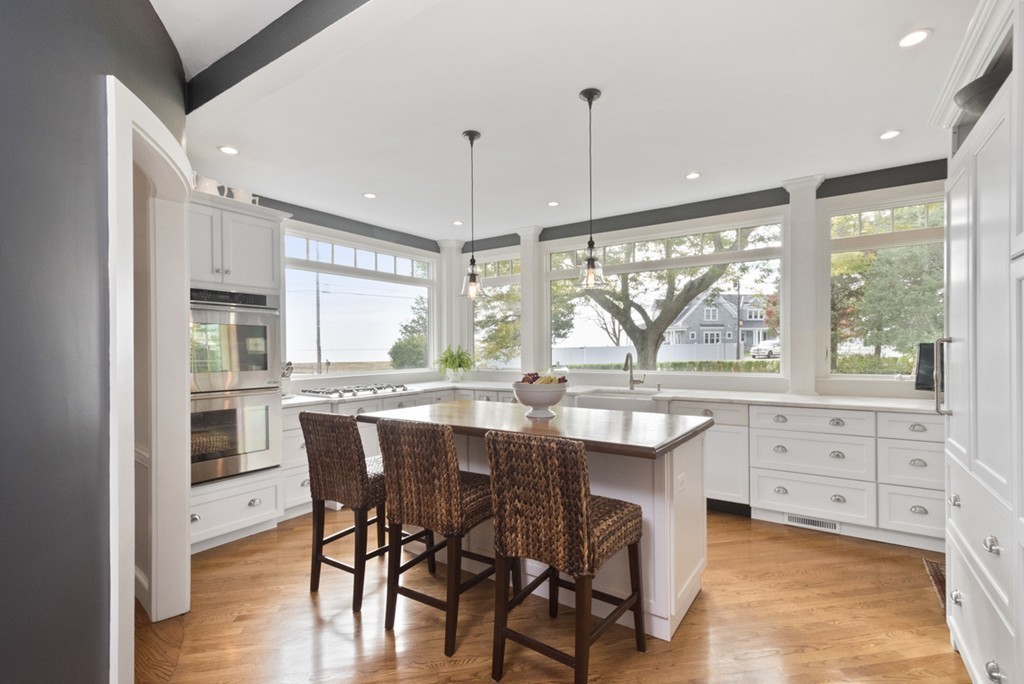 282 King Caesar Road Duxbury, MA 02332 - Photo 14 of 30 a large kitchen with granite countertop lots of counter space and windows