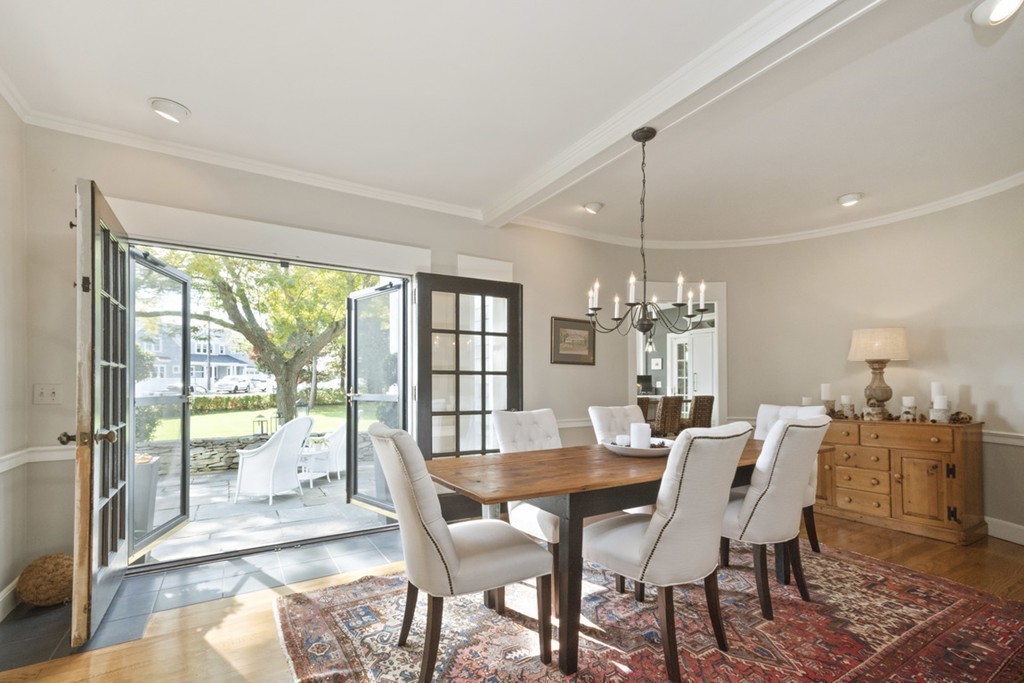 282 King Caesar Road Duxbury, MA 02332 - Photo 16 of 30 a dining room with furniture a chandelier and wooden floor