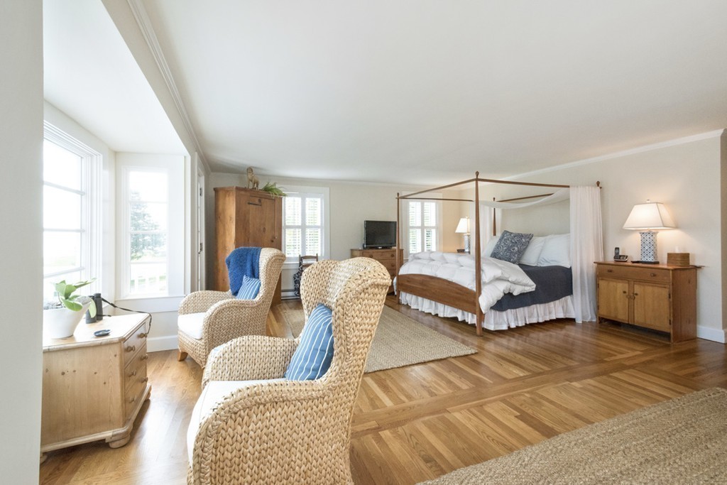 282 King Caesar Road Duxbury, MA 02332 - Photo 23 of 30 a living room with furniture a lamp and a large window