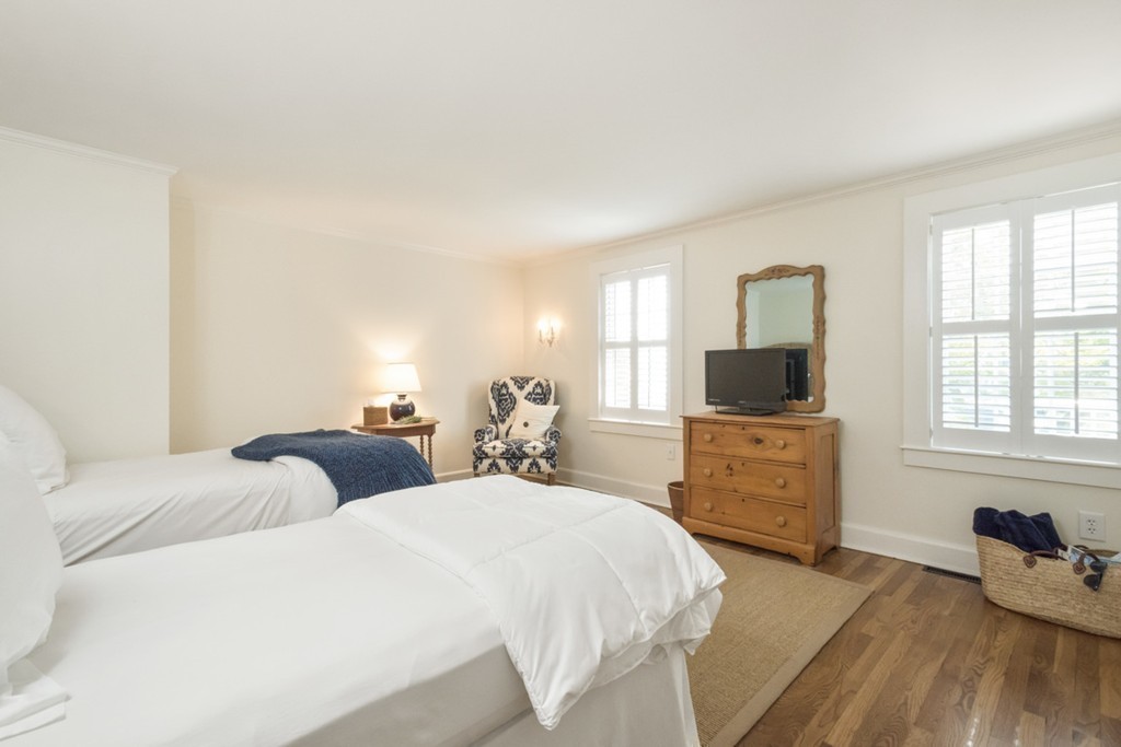 282 King Caesar Road Duxbury, MA 02332 - Photo 24 of 30 a bedroom with two beds and a flat screen tv