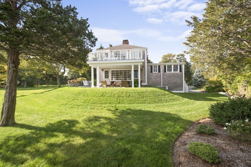 282 King Caesar Road Duxbury, MA 02332 - Photo 7 of 30 a view of a house with a big yard and large trees