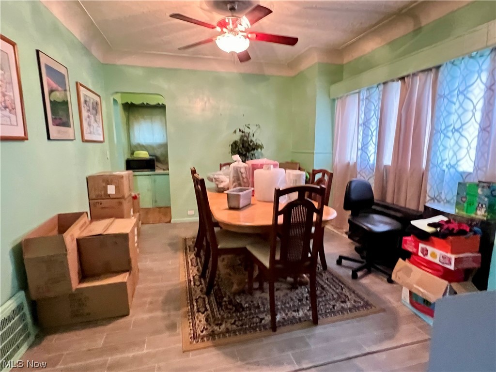 1761 Wayside Road Cleveland, OH 44112 - Photo 4 of 18 Dining space with ceiling fan