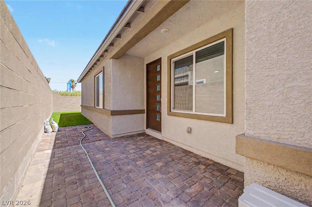 226 Augusta Ridge Henderson, NV 89015 - Photo 32 of 47 This private outdoor space features durable pavers and low-maintenance landscaping for comfortable living.