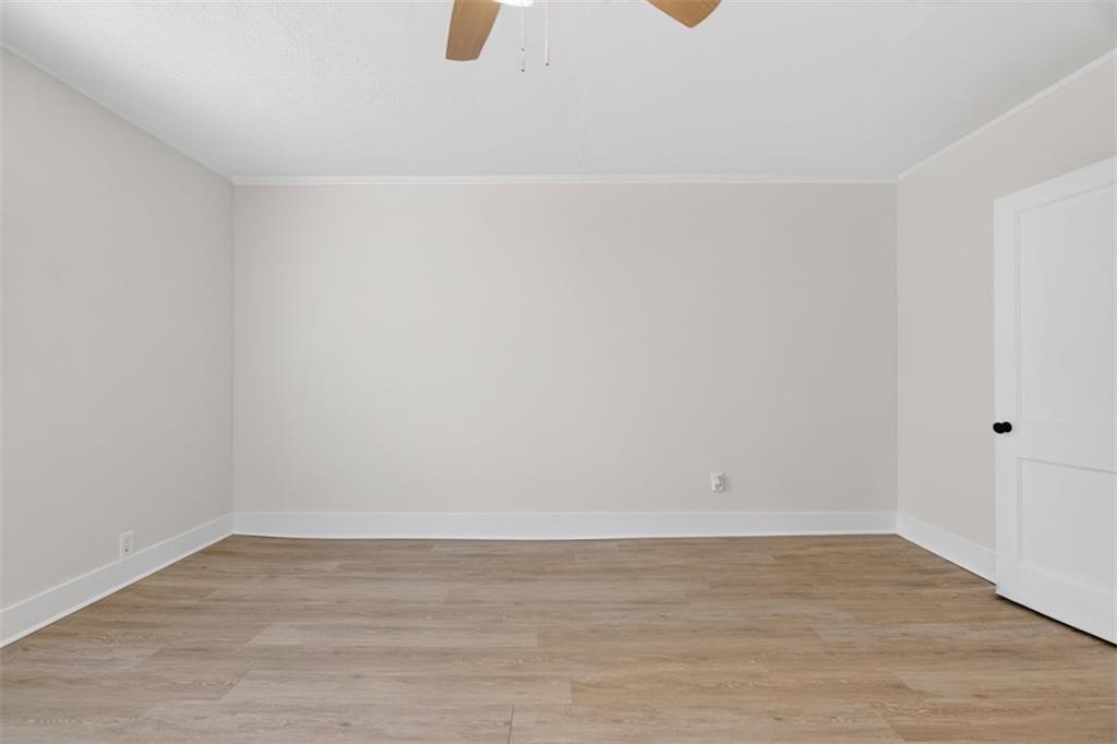 246 Spring Street Commerce, GA 30529 - Photo 12 of 23 a view of an empty room