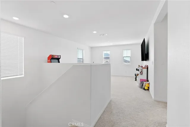 a room with furniture and a flat screen tv