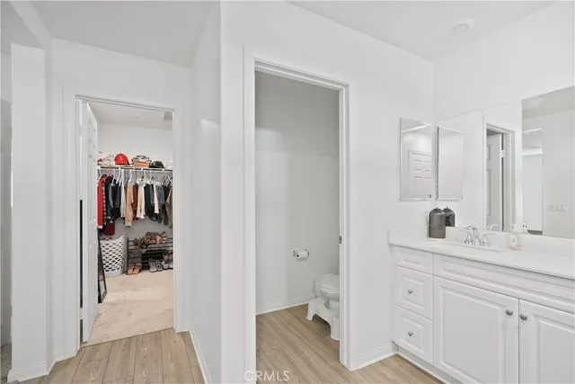 a en suite bathroom with a sink and mirror