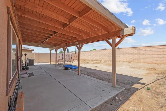 a view of a backyard of a house