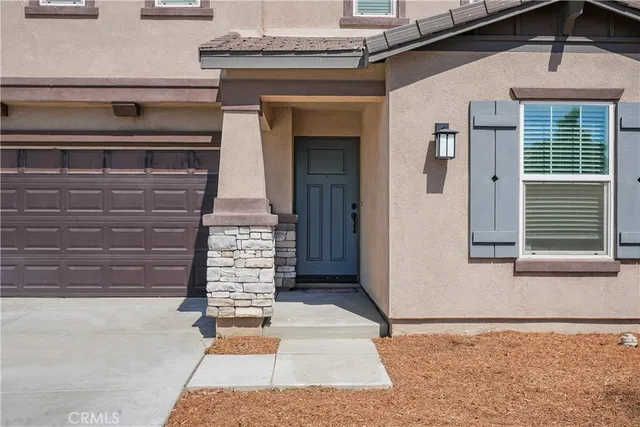 a front view of a house with entryway