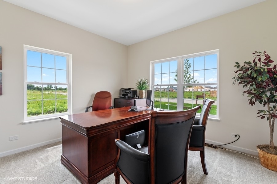 1004 Lexington Street McHenry, IL 60050 - Photo 15 of 20 a dining room with a window table and chairs