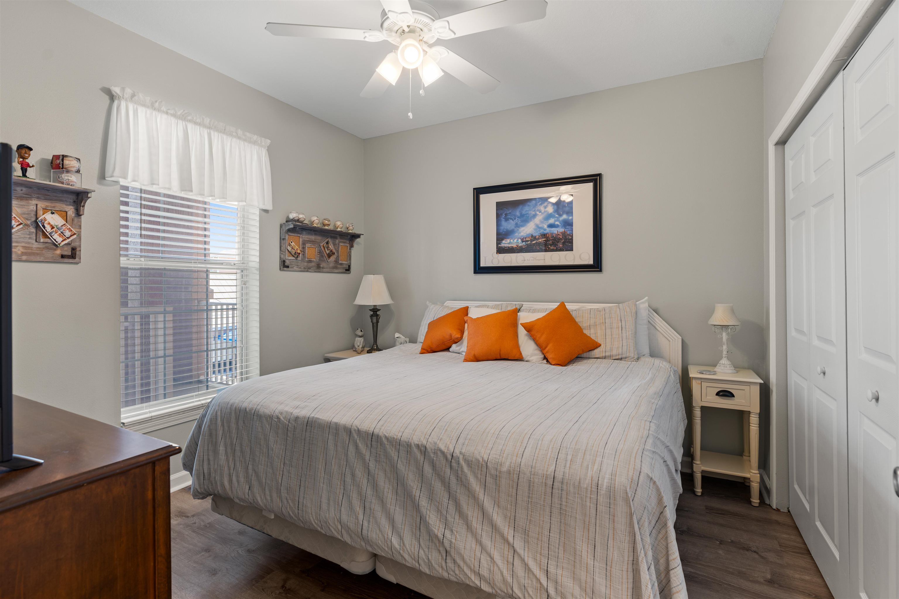 255 Atlantis Circle, Unit D202 St. Augustine Beach, FL 32080 - Photo 19 of 45 a bedroom with a bed and a painting on the wall