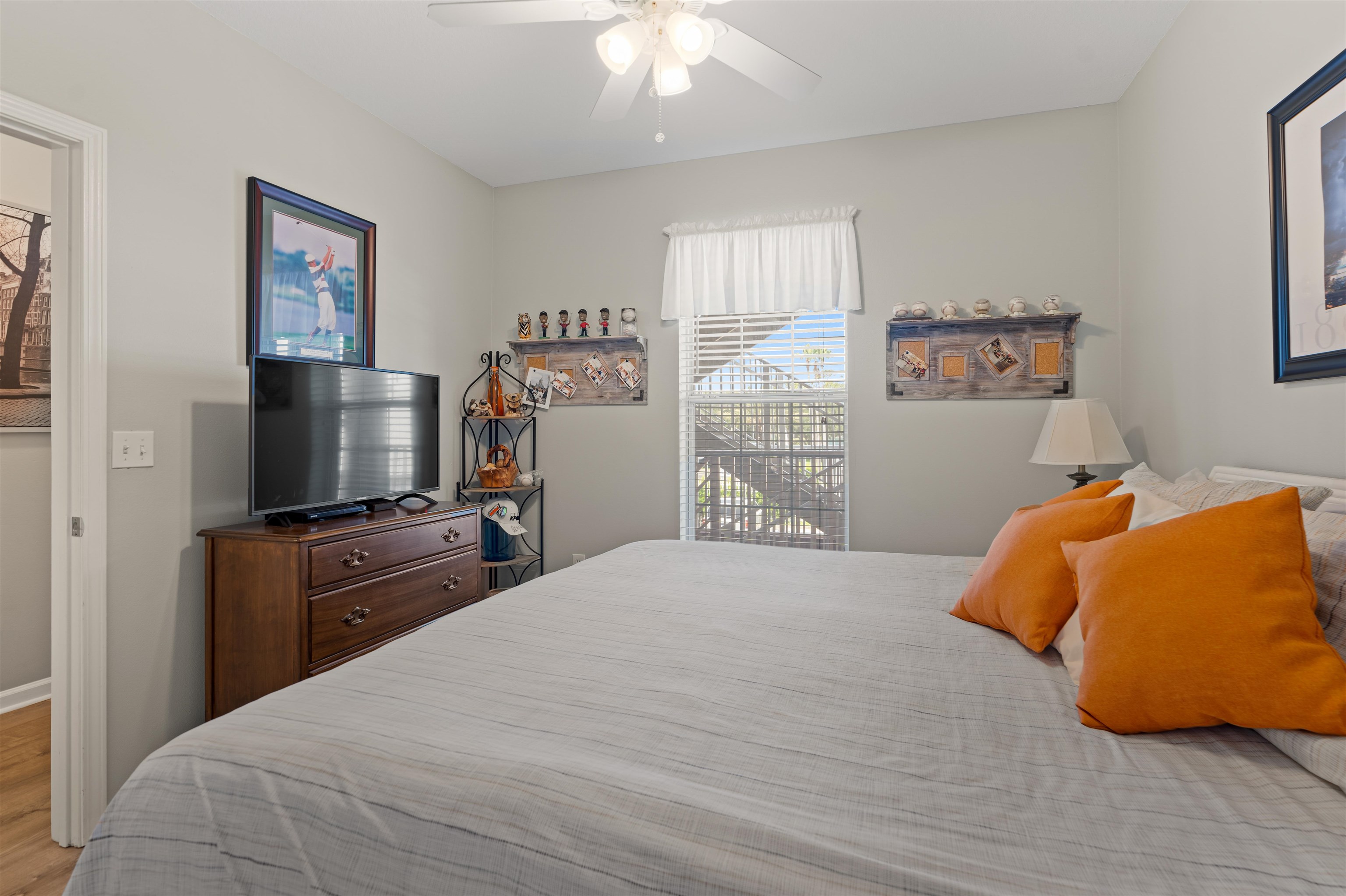 255 Atlantis Circle, Unit D202 St. Augustine Beach, FL 32080 - Photo 20 of 45 a bedroom with a bed and a flat screen tv