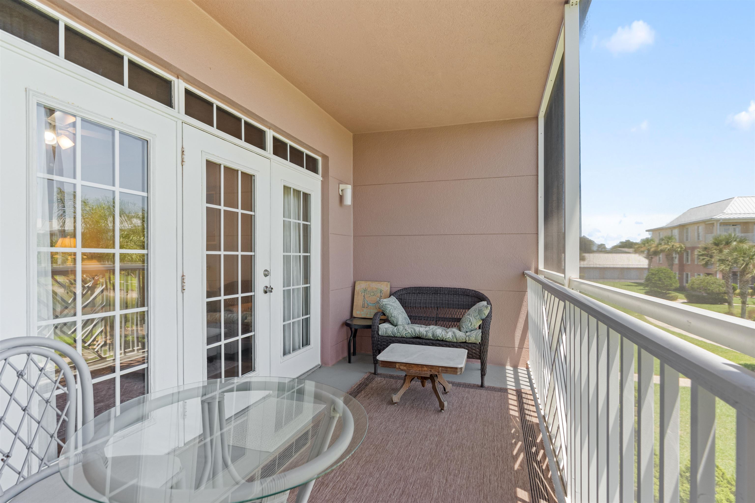 255 Atlantis Circle, Unit D202 St. Augustine Beach, FL 32080 - Photo 29 of 45 a living room with furniture and a window