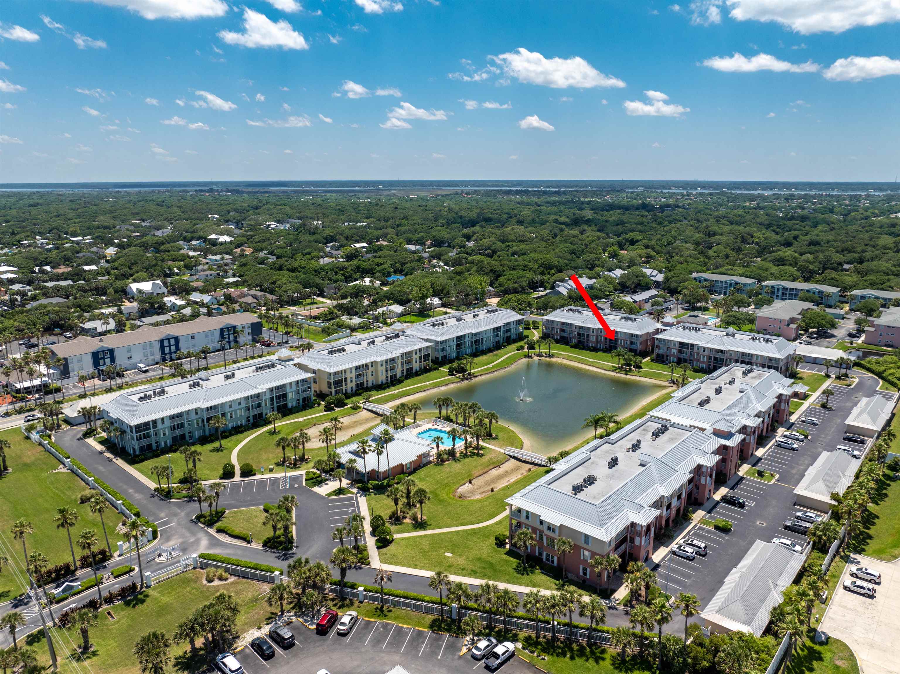 255 Atlantis Circle, Unit D202 St. Augustine Beach, FL 32080 - Photo 37 of 45 an aerial view of a city