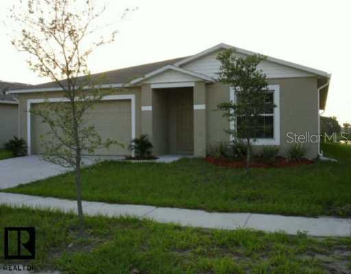 13751 Vanderbilt Road Odessa, FL 33556 - Photo 1 of 1 front view of a house with a yard
